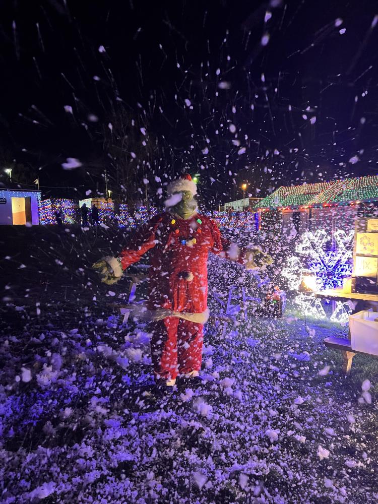 Saundersfoot Christmas light switch on illuminates village