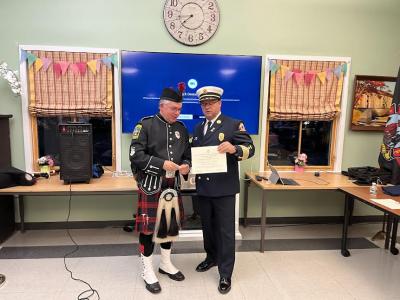 Capt. David DeBest, who also played the bagpipes during the ceremony, received recognition for 35 years of fire service.