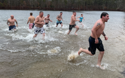 Brave participants braved the cold at Clear Pond in Lakeville March 11 to raise money for Special Olympics. Photo by Sandy Quadros Bowles