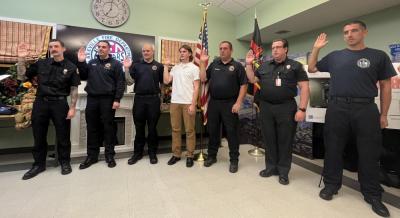 Firefighters Jay Davies, PJ Machunski, Jonathan Villa, Alex Copeland, Charles Delisle, Ethan Hecht, Roy Morse, Wayne Morse and Paramedic Dan Pollard were sworn in. Not all were present for the occasion.