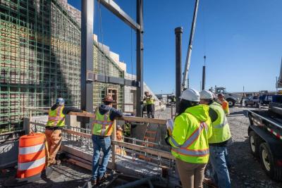 Construction workers work on the New Bedford station. Source: Massachusetts Bay Transportation Authority