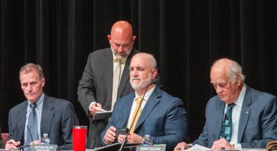 From left, Finance Committee members Alan Kirschner, Eric Machado, Matthew Phillips and Robert Sullivan at the April 28 Town Meeting.