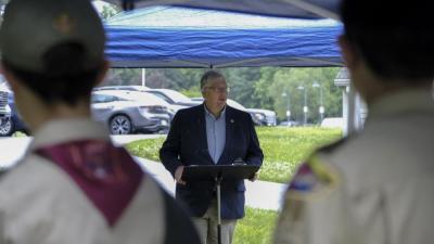 Lakeville State Representative Norman Orrall speaks to the scouts of Troop 26 during the flag retirement ceremony at the Lakeville United Church of Christ on Saturday, June 14.