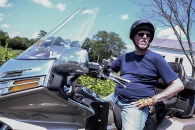 Bob Pickup, a Fairhaven resident, sits on his Honda Goldwing motorcycle off of Precinct Street in Lakeville on Saturday, June 21. Pickup said he enjoys going for a cruise on the wooded back roads of Lakeville where he often spots Bald Eagles and hawks.