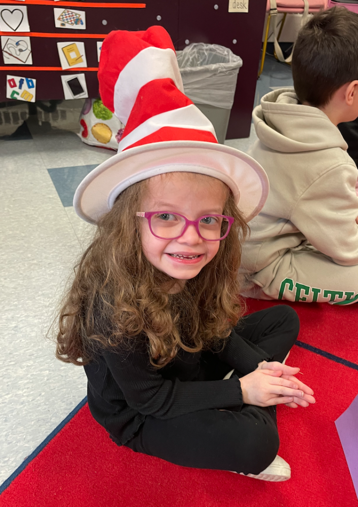 Tessa O’Connell wears an appropriate hat during a Read Across America celebration at Memorial Early Childhood Center. Photos by Sandy Quadros Bowles