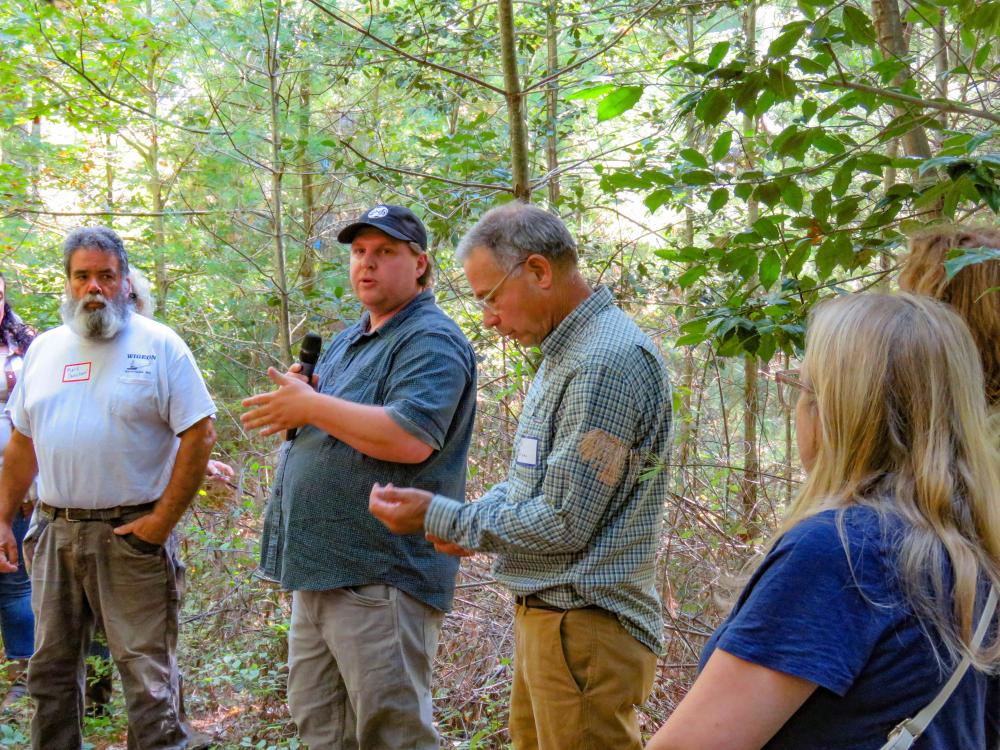 Tom Farrell (center), a Middleboro forester, answers questions during a tour of the Frederick Weston Memorial Forest. Tom Farrell (center), a Middleboro forester, answers questions during a tour of the Frederick Weston Memorial Forest.