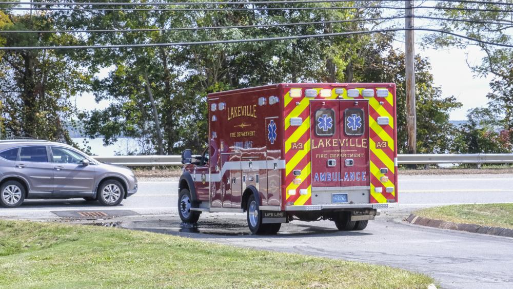 An ambulance pulls out onto Bedford Street while responding to a medical emergency. Fire Chief Michael O'Brien said the line-of-sight for incoming traffic will be improved immensely at the new station. NONE