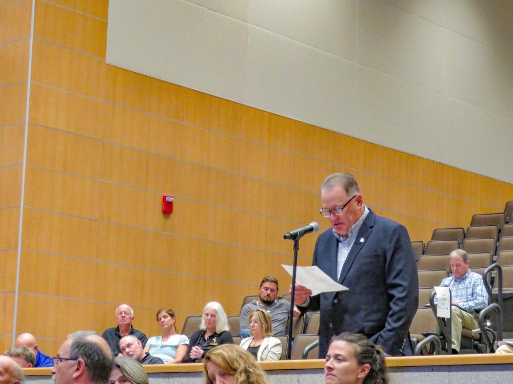 Select Board member Brian Giovanoni proposes an amendment to the school board article at the Special Town Meeting Oct. 6