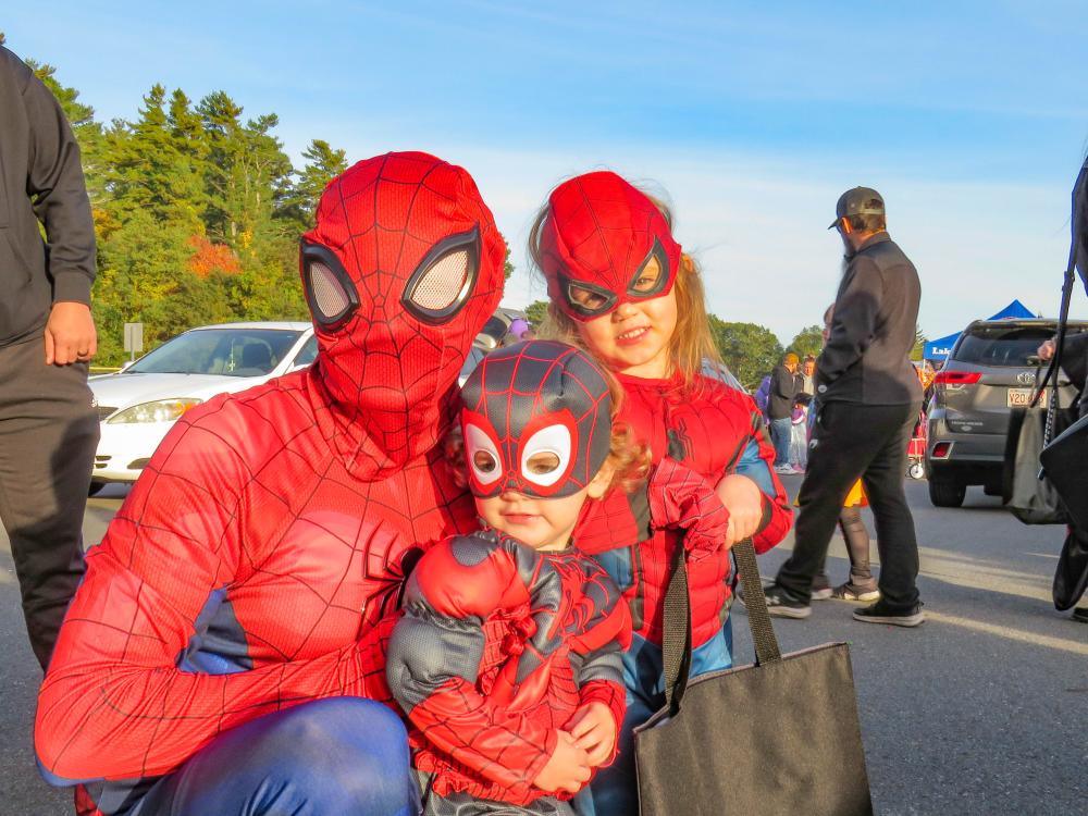 DJ Footit (left) and his two children pose in their coordinating costumes. DJ Footit (left) and his two children pose in their coordinating costumes.