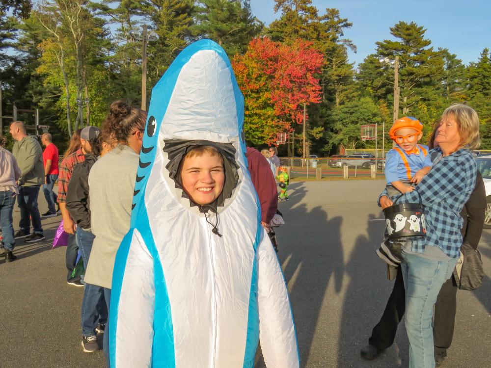 Teddy Quinn, 10, poses in his inflatable shark costume. Teddy Quinn, 10, poses in his inflatable shark costume.