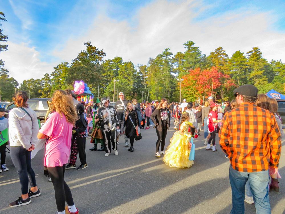 People of all ages fill the Ted Williams Camp parking lot. People of all ages fill the Ted Williams Camp parking lot.