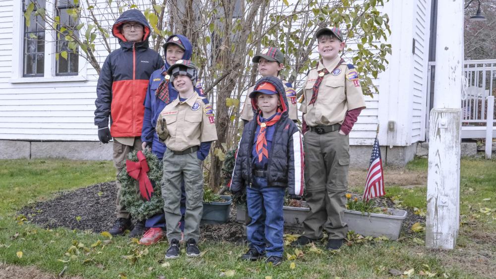 Cub Scouts pose at the ceremony. Photo by Sam Tucker