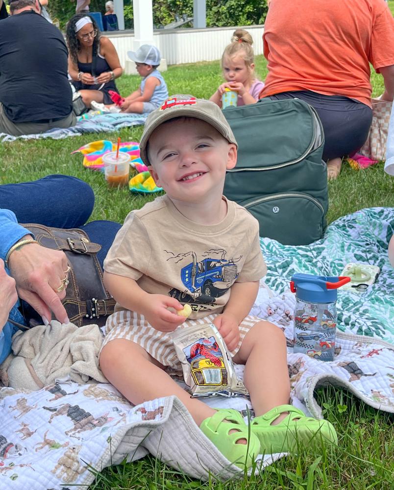 Calvin Carter, 2, is excited to see some bubbles. Photo by Christian Uva