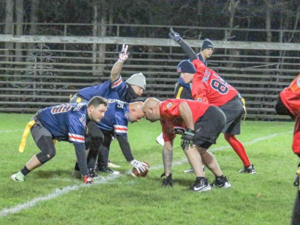 Members of the police and fire departments go head-to-head on Battis Field on Friday, Nov. 21. Photos by Grace Roche