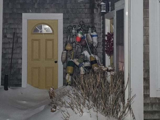 Snow piles up outside a Middleboro house. Photo source: Lorna Brunelle
