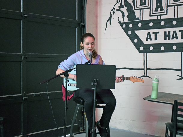 Mary Osborne sang and played her guitar live during the market.