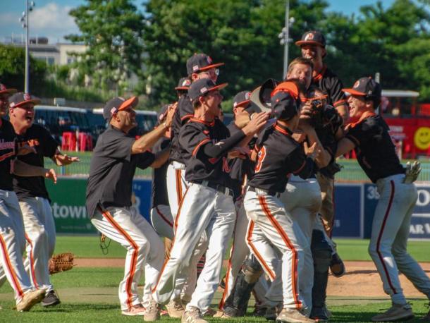 Middleboro players and coaches rush the field as the team clinched a state championship win at Polar Park on Saturday, June 13. Photos by Grace Roche