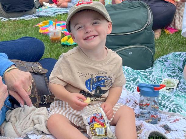 Calvin Carter, 2, is excited to see some bubbles. Photo by Christian Uva