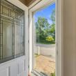 Front entry door with a decorative glass panel at the first-floor apartment, 17 Beeden Road, Westport