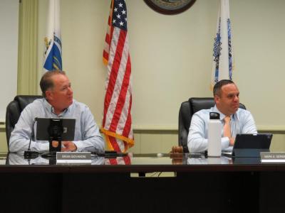 Select Board members Brian Giovanoni and Mark Germain at the board meeting. 