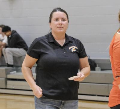 Middelboro Sachems Head Coach Alicia Laine looks on during the third set of the match.