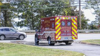 An ambulance pulls out onto Bedford Street while responding to a medical emergency. Fire Chief Michael O'Brien said the line-of-sight for incoming traffic will be improved immensely at the new station. NONE