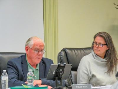 Select Board members Thomas White and Teresa Farley at the board meeting Monday night. 
