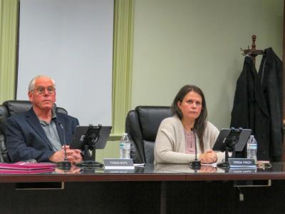 Select Board members Thomas White and Teresa Farley listen to the decision of the Charter Review Committee at the Monday, Nov. 17 Select Board meeting. Photo by Grace Roche