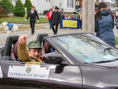 A Marine Corps veteran drives through Middleboro as part of the parade. Photo by Grace Roche