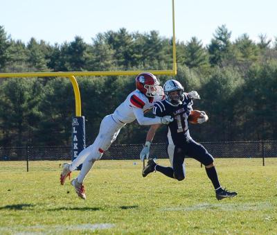Joseph Procaccini avoids a tackle.
