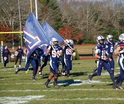 Zach Menendez carries the flag.