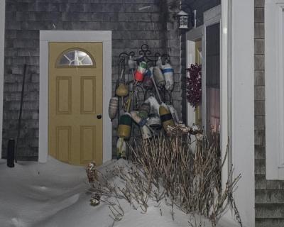 Snow piles up outside a Middleboro house. Photo source: Lorna Brunelle