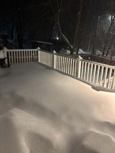 A house is 'decked' with snow. Photo source: Elizabeth Poirier