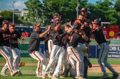 Middleboro players and coaches rush the field as the team clinched a state championship win at Polar Park on Saturday, June 13. Photos by Grace Roche