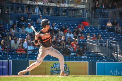 Ryan Tullish looks for a hit. 
