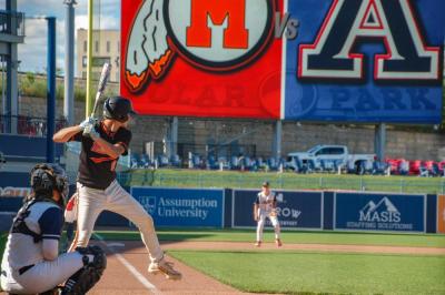 Center fielder Jayden Murphy stands at the plate. 