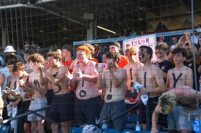 Some fans wore body paint in support of their team. 