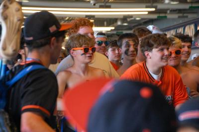 Middleboro fans look on as the victorious team makes its way off the field. 