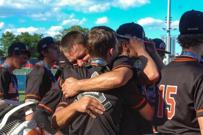 Middleboro players embrace as they celebrate their win. 
