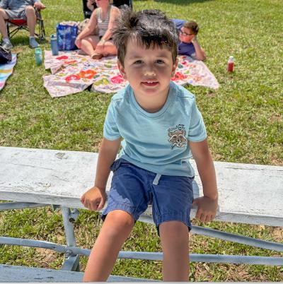 Miles Kruja, 3, takes a break. 