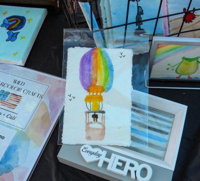 Cali Ieronimo's favorite artwork at the booth was a painting of a hot air balloon.