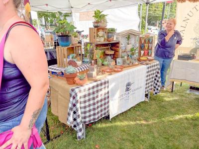 The Walnut Plant Gardens' booth. Photo by Christian Uva