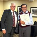 State Rep. Norman J. Orrall presents Bob Saquet with an award from the Massachusetts House of Representatives at a recent surprise retirement celebration. Photo source: Middleboro-Lakeville Rotary Club NONE