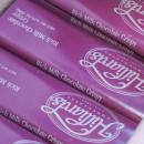 A box of candy bars rests cooly in a cooler in the trunk of Reagan's car. He said he always travels with a couple coolers packed full of chocolate to sell. NONE