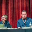 School committee members Susan Pennini and Christopher Benson during the committee's meeting. 