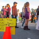 A sign tells trunk or treaters where to find the displays of various groups. 