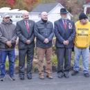Veteran members of the crowd pose together during the ceremony.