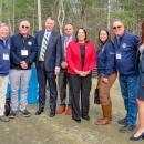 Middleboro officials, Driscoll and state Sen. Kelly Dooner pose together. 