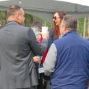 Attendees, including Dooner (center), toast after the ceremony. 