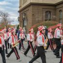 The John T. Nichols Middle School marching band walks past the Middleboro Town Hall. Photo by Grace Roche